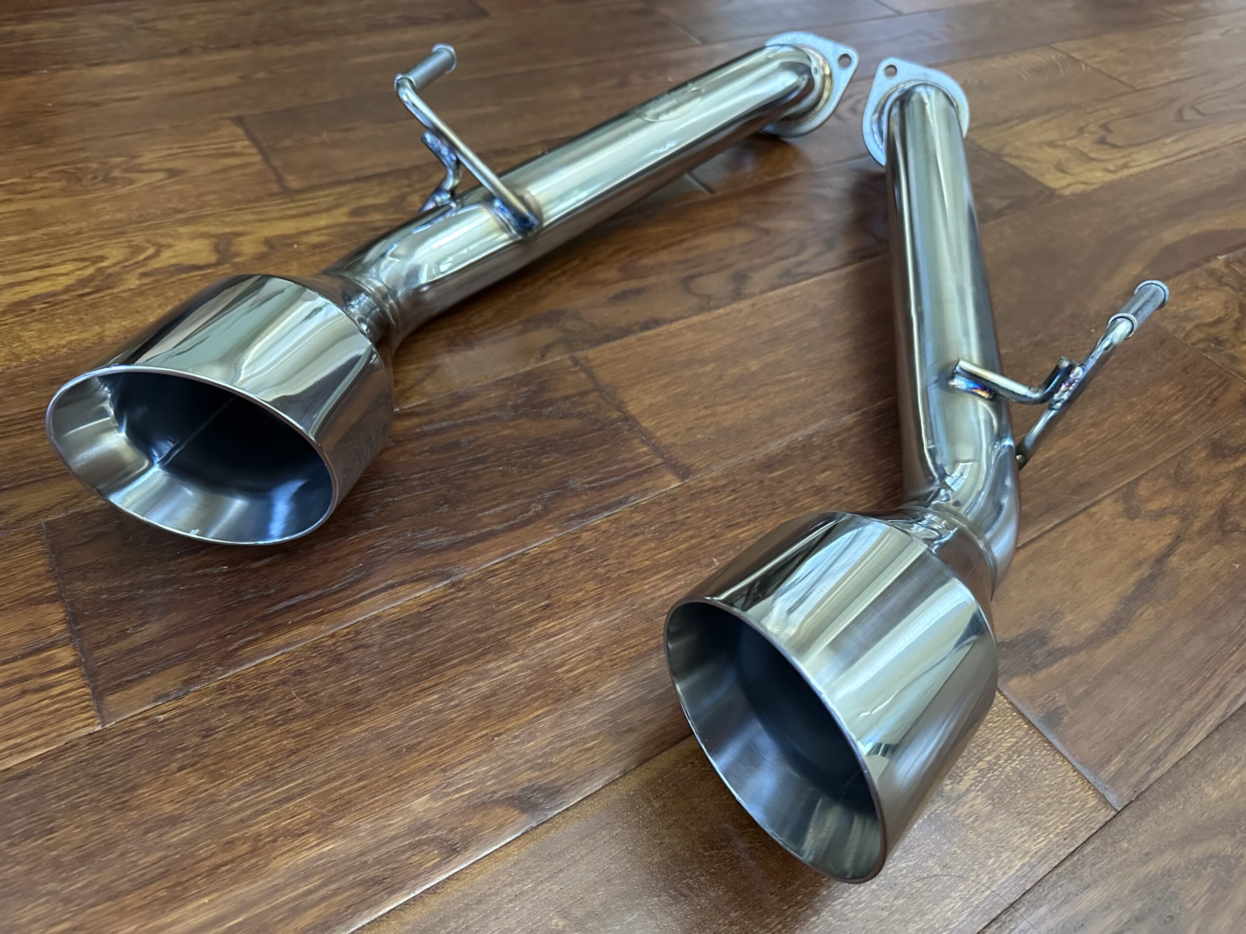 Pair of polished stainless steel exhaust tips